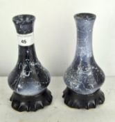 A pair of early 20th century glazed pottery spill vase, with flared rim,