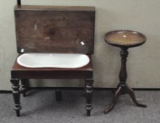 A Victorian mahogany tripod table, with a circular top and on splayed supports, height 60cm,