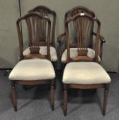 Four dining chairs by William Bartlett, including one carver,