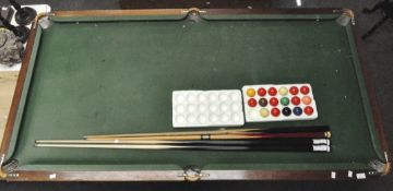 An Olympus Classic quarter size snooker table with balls and cues,