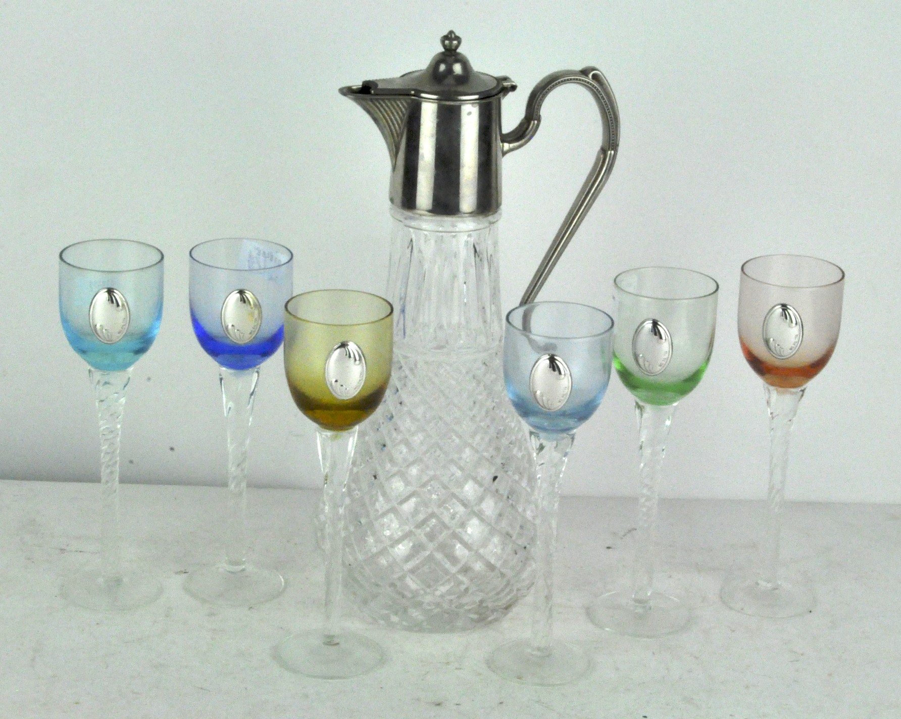 A set of six coloured glass Italian aperitif glasses,