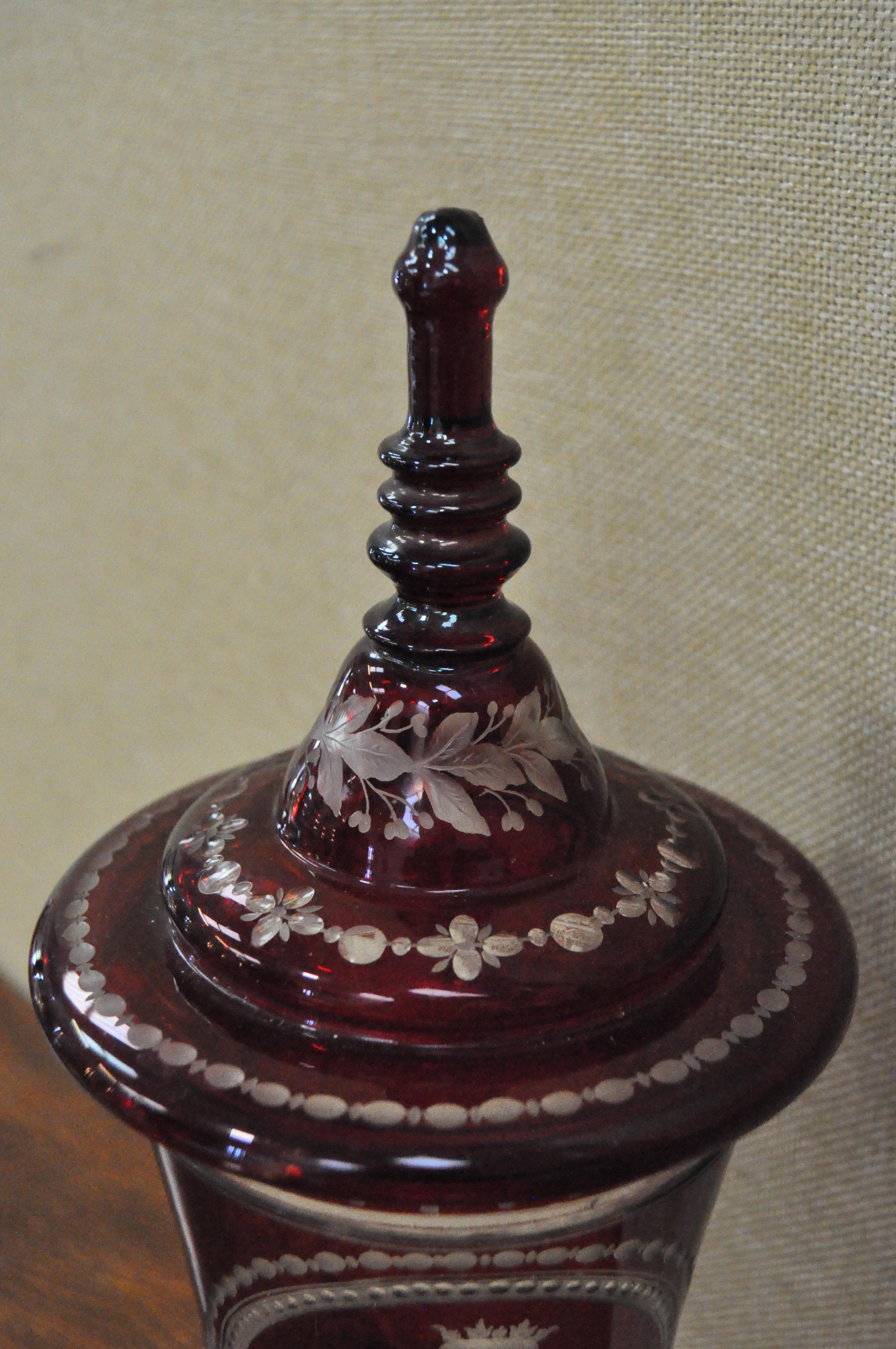A late 19th century Bohemian ruby glass lidded vase, - Image 4 of 5