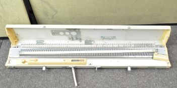 A Brother KH-710 knitting machine, made in Japan,
