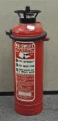 A vintage Minimax fire extinguisher