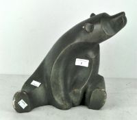 An Austin modern figure depicting a seated polar bear,