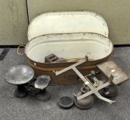 A vintage scumbled tin bath and cover, twin handled,