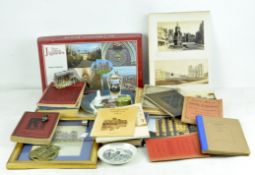 A collection of early guide books, photos and other items relating to Wells,