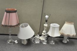 Seven assorted table lamps, including two in marble-onyx,
