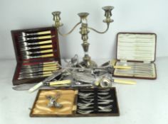 A collection of assorted silver plated wares, to including a three sconce candelabra, flatware,