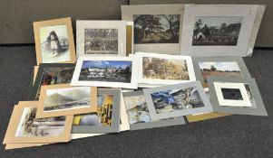 A collection of mounted prints, including works by Monet,