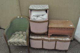 A wicker bedside cabinet a pink blanket box, a green wicker chair and a stool,