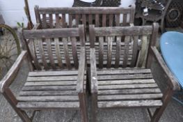 A three piece teak garden bench set with slatted seats and backs, bench height 85 x width 122 cm,