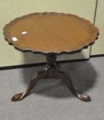 A late 19th/early 20th century mahogany tilt top occasional table,