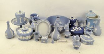 A large quantity of Wedgwood Jasperware in blue & white including jars and covers,