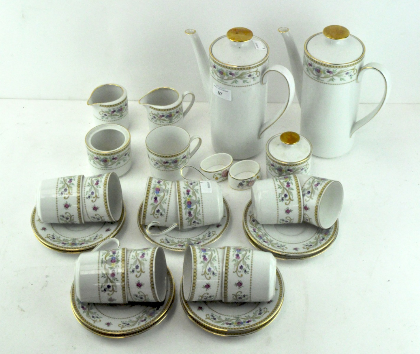 A German coffee service by Seltmann Weiden, with floral printed patterns, comprising coffee pots,