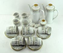 A German coffee service by Seltmann Weiden, with floral printed patterns, comprising coffee pots,