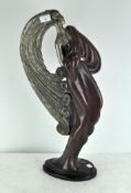 A large retro sculpture by Austin Productions 1986, signed to side 'La Clerc', depicting a lady,