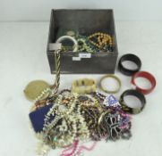 An assortment of costume jewellery,