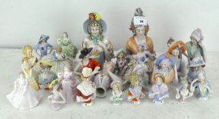 An extensive collection of ceramic Pin cushion heads, of various sizes and designs,