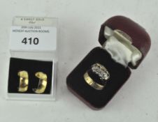 Three 9ct gold rings, two set with stones, together with a pair of plated earrings