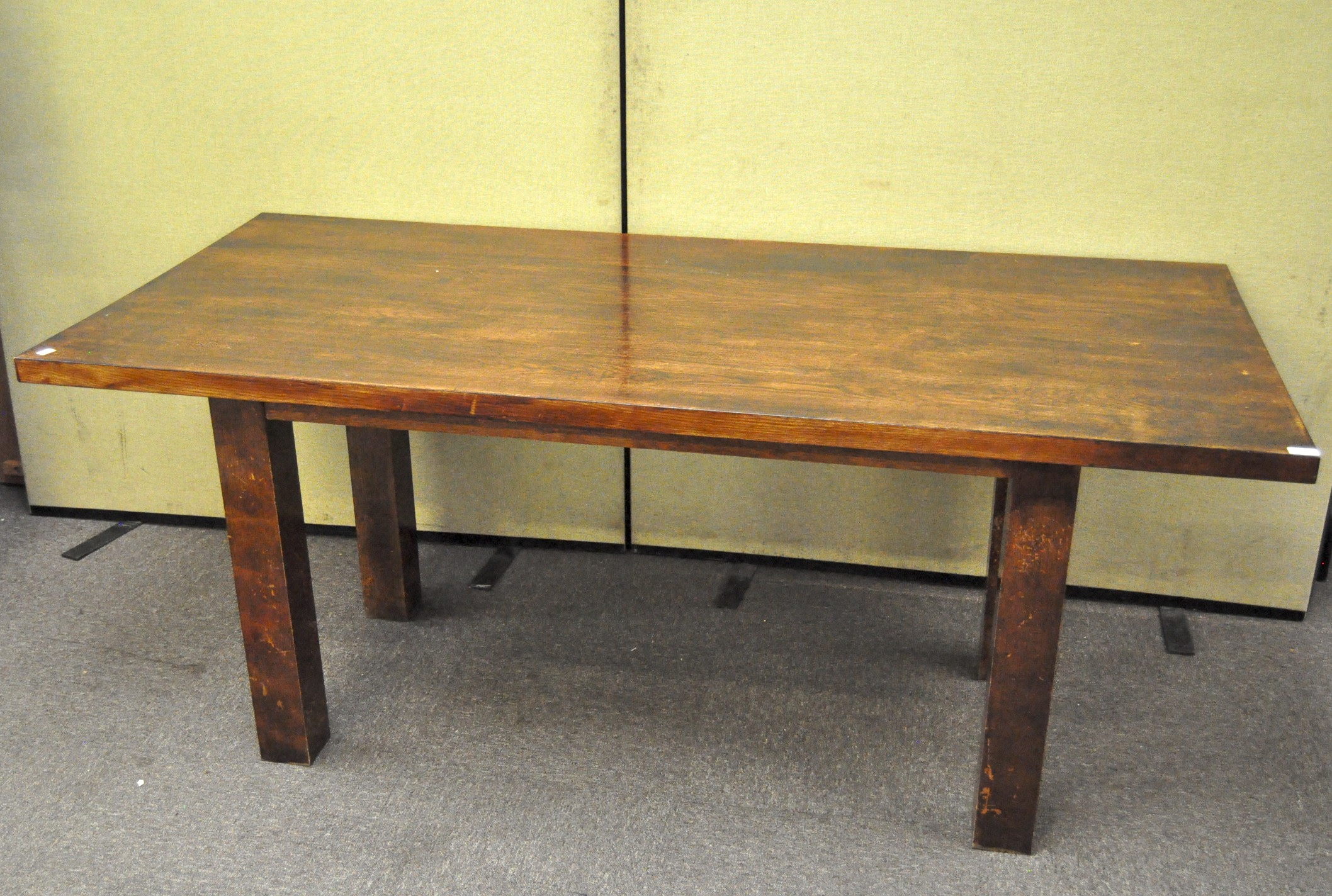 An oak rectangular dining table, 20th century, on square legs,