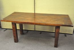 An oak rectangular dining table, 20th century, on square legs,