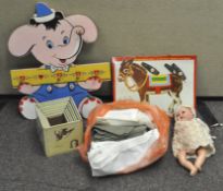 A group of collectables, including a vintage German doll,