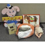 A group of collectables, including a vintage German doll,