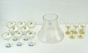 A collection of mixed glassware, including eight Babycham coupes,