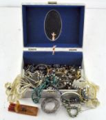 A box of costume jewellery including necklaces, bracelets, rings,