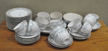 An extensive early 20th century porcelain tea set