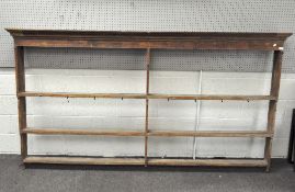 A large vintage pine three shelf plate rack/dresser top,