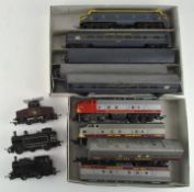 A selection of Tri-ang coaches and locomotives, including an R-52,