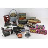 A collection of assorted vintage toys and other items including: vintage trains, a station,