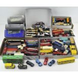 A large quantity of boxed die cast cars and vehicles (over 60), including vans, tankers, cars,