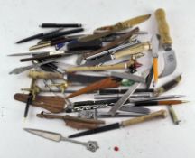 A selection of vintage pens, including Ronson, Parker, Aurora, Paper Mate and others,