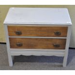 A small grey painted chest of drawers with two long drawers,