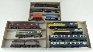 A collection of Lima 00 gauge locomotives, including the Intercity 125, together with coaches,