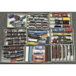 A quantity of 00 gauge freight stock, including Triang, Hornby, Lima and others