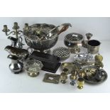 A collection of silver plated and other metalwares to include a punch bowl and cups, candlesticks,