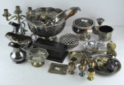 A collection of silver plated and other metalwares to include a punch bowl and cups, candlesticks,