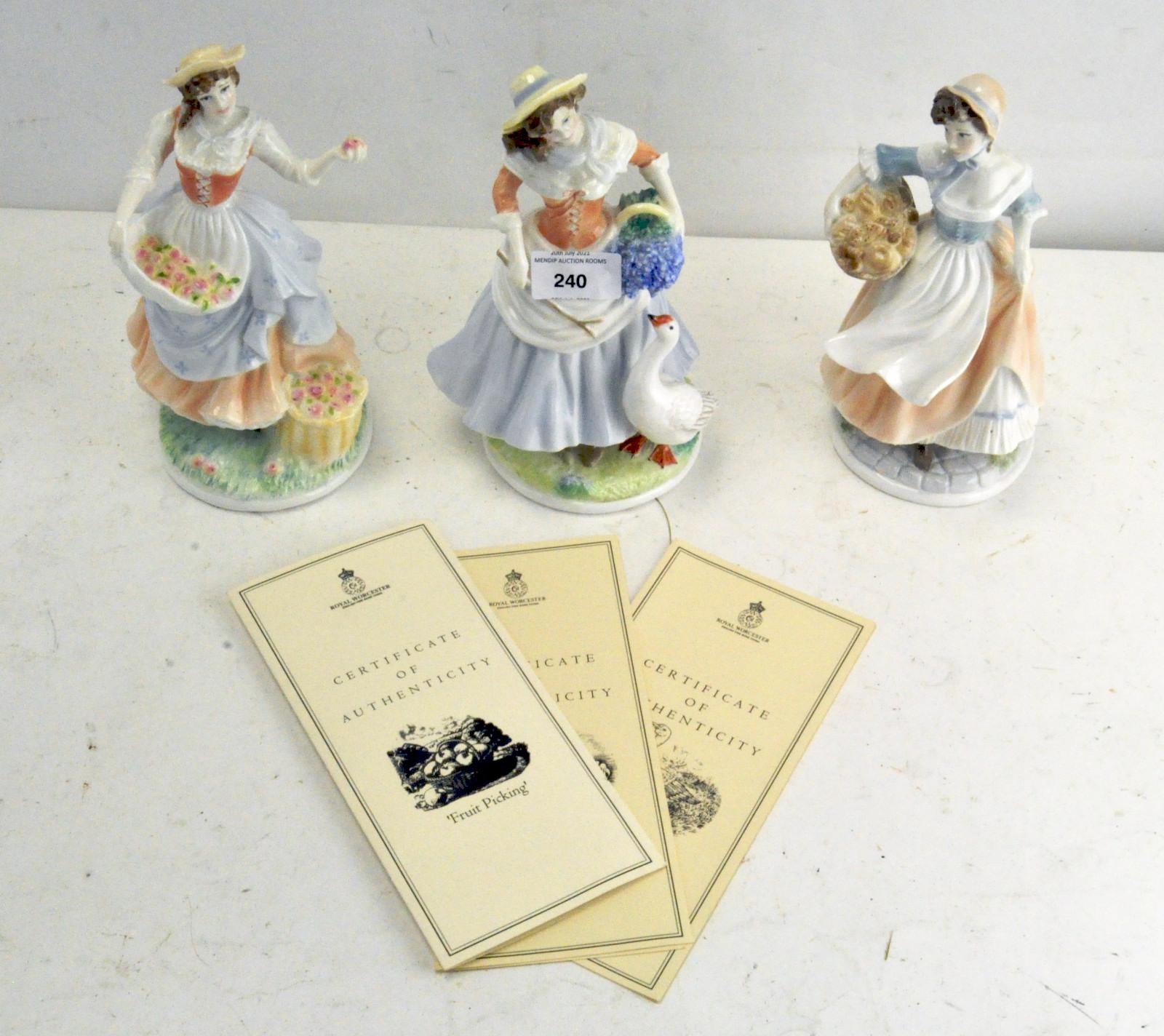 Three Royal Worcester figures of ladies, 20th century