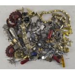 A box of costume jewellery, including earrings, necklaces,