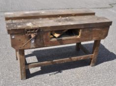 A vintage work bench with a Parkinsons Perfect vice attached,