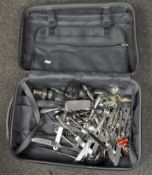 A suitcase containing modern silver plate,