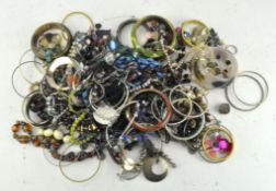 A large quantity of costume jewellery, including bangles, necklaces, pendants,