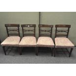 A set of four Regency style mahogany chairs, with bar and pierced backs,