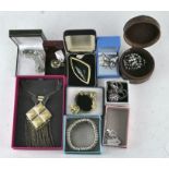 A group of costume jewellery including necklaces, bracelets and more,