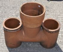 A large H-top chimney pot,