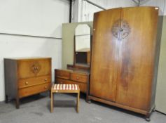 An oak four piece Art Deco style bedroom suite